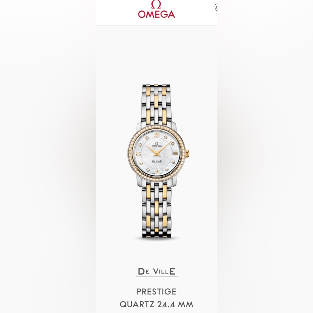 TheOMEGADeVillePrestigeclassic
features a two-tone mother-of-pearl Diamond bezel